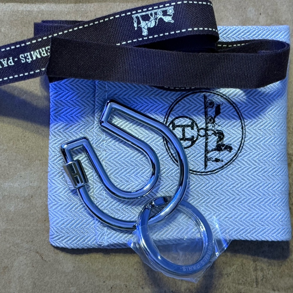 Hermès Blue Keychain with Silver Accents